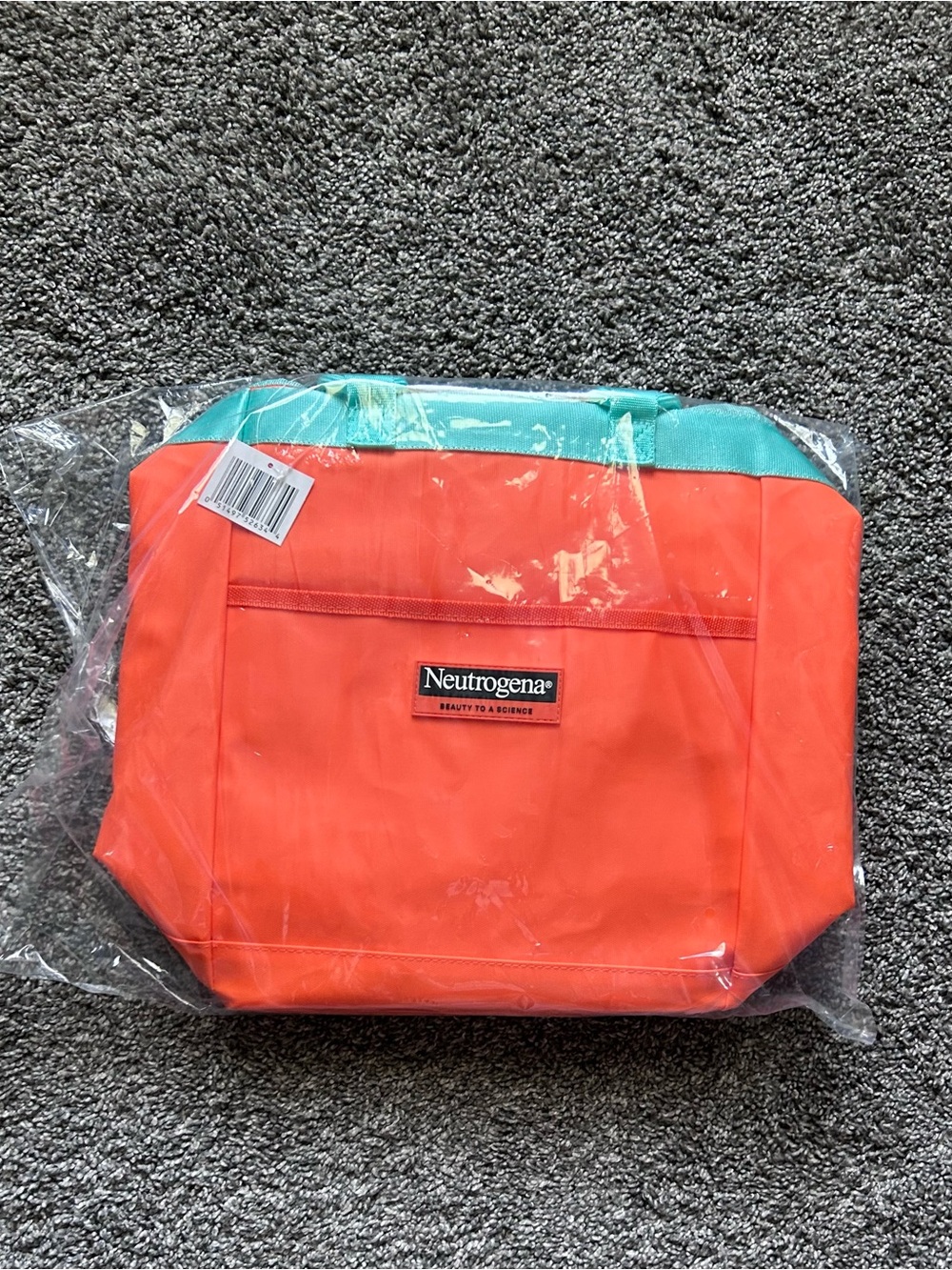 Neutrogena Coral Orange Cosmetic Pouch with Teal Trim
